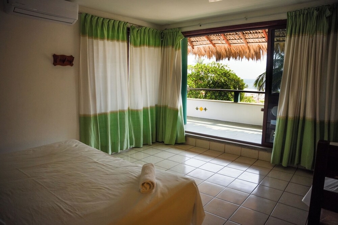Imagen de la habitación del Hotel Puerta Del Sol, Puerto Escondido. Foto 11
