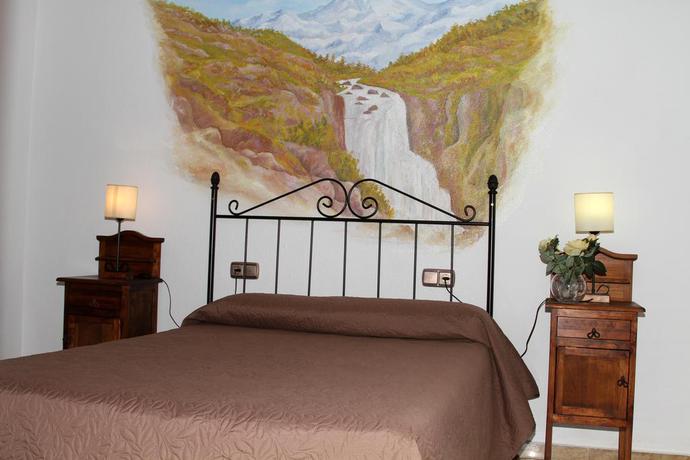 Imagen de la habitación del Hotel Puerta Nazarí. Foto 9