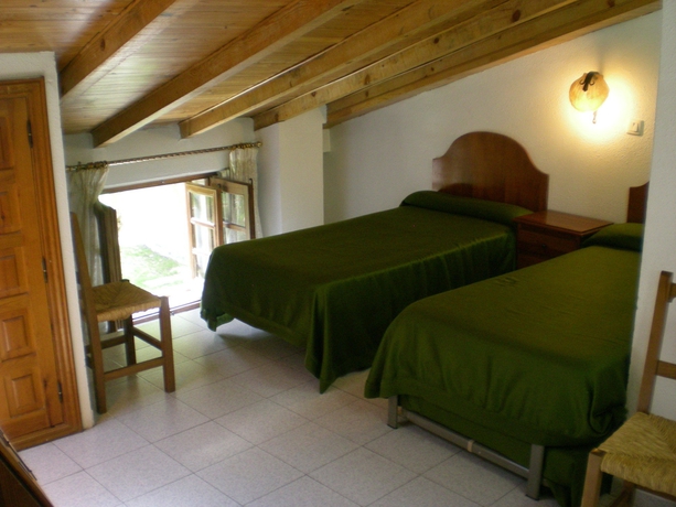 Imagen de la habitación del Hotel Puerta Romeros. Foto 11