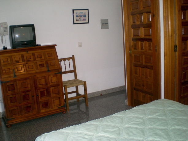 Imagen de la habitación del Hotel Puerta Romeros. Foto 12