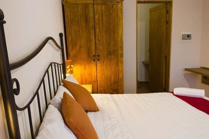 Imagen de la habitación del Hotel Puerta San Pedro. Foto 5