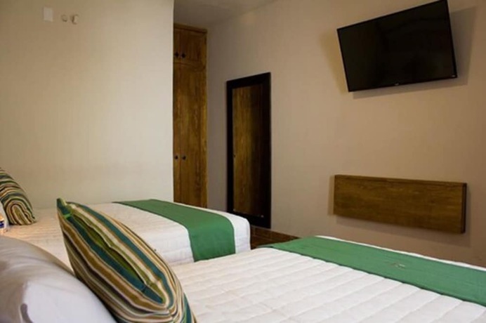 Imagen de la habitación del Hotel Puerta San Pedro. Foto 12