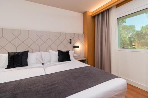 Imagen de la habitación del Hotel Puerta Santander. Foto 5