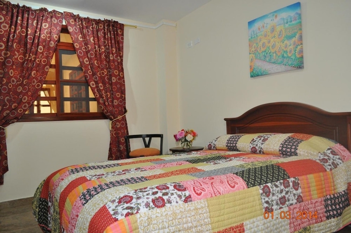 Imagen de la habitación del Hotel Puerta Sol Inn. Foto 12