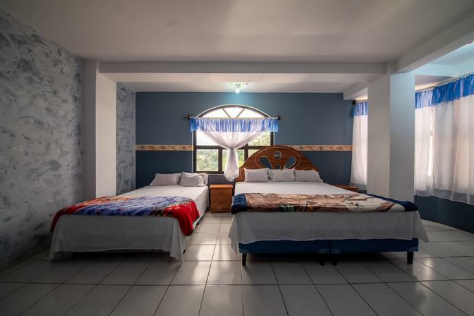 Imagen de la habitación del Hotel Puerta al Cielo. Foto 17