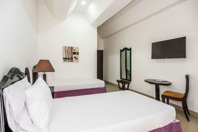 Imagen de la habitación del Hotel Puerta de Oro. Foto 5