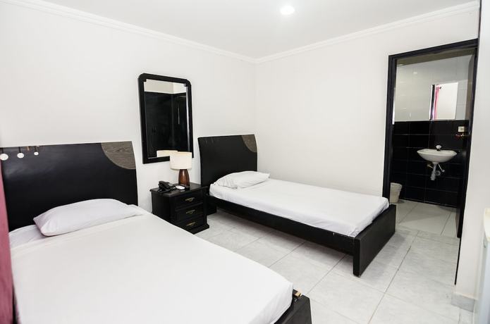 Imagen de la habitación del Hotel Puerta de Oro. Foto 6