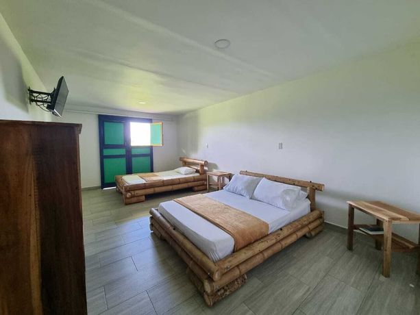 Imagen de la habitación del Hotel Puerta del Caf&eacute;. Foto 11