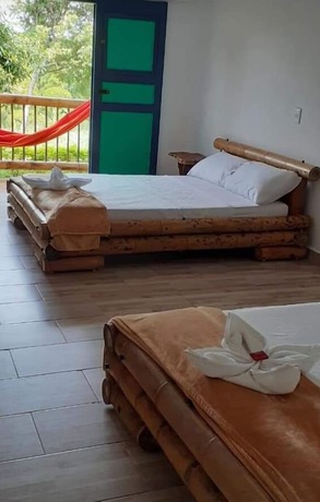 Imagen de la habitación del Hotel Puerta del Caf&eacute;. Foto 13