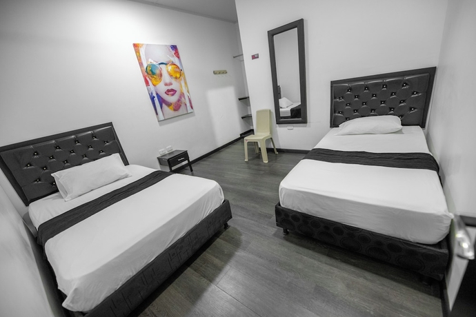 Imagen de la habitación del Hotel Puerta del Sol de Uraba. Foto 10