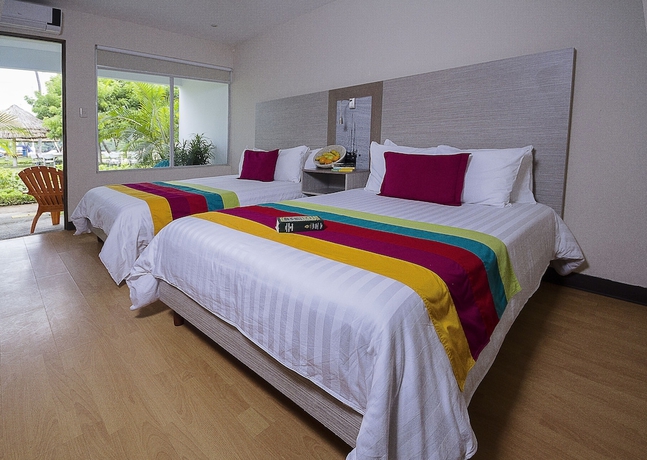 Imagen de la habitación del Hotel Puerto Azul Boutique Resort and Marina. Foto 8