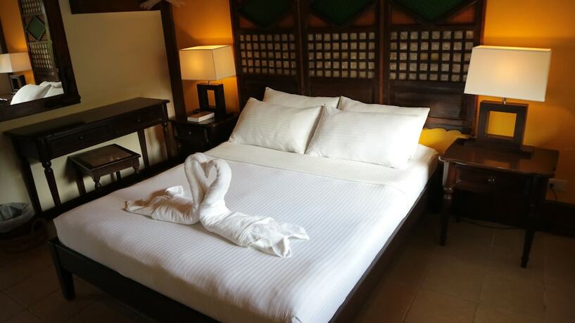 Imagen de la habitación del Hotel Puerto Del Sol Beach Resort. Foto 13