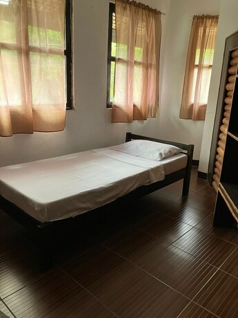 Imagen de la habitación del Hotel Puerto Galera Boutique Resort. Foto 14