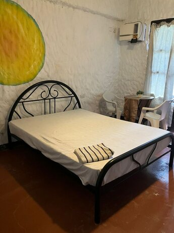 Imagen de la habitación del Hotel Puerto Galera Boutique Resort. Foto 16