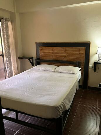 Imagen de la habitación del Hotel Puerto Galera Boutique Resort. Foto 17