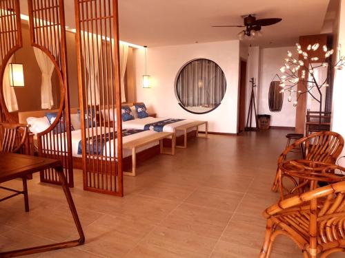 Imagen de la habitación del Hotel Puerto Galera Seaview Resort. Foto 15
