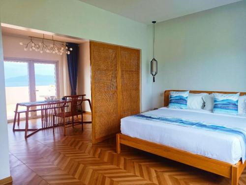 Imagen de la habitación del Hotel Puerto Galera Seaview Resort. Foto 16