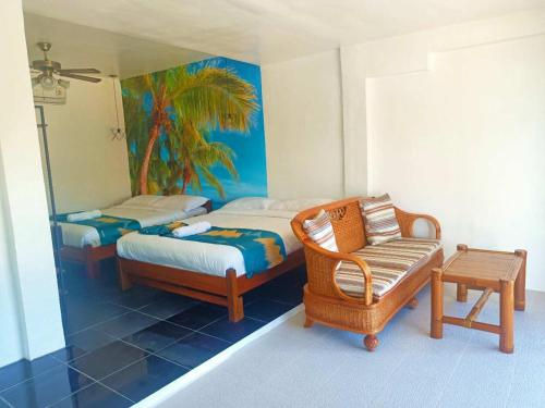 Imagen de la habitación del Hotel Puerto Galera Seaview Resort. Foto 17