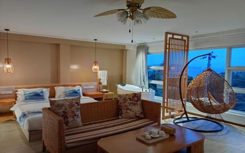 Imagen de la habitación del Hotel Puerto Galera Seaview Resort. Foto 18