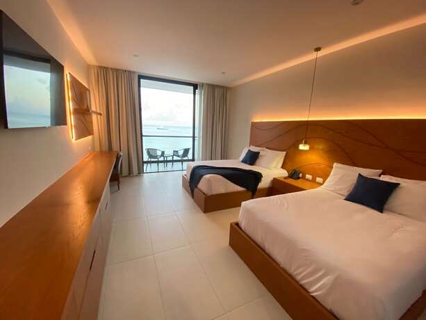 Imagen de la habitación del Hotel Puerto Libre Cozumel. Foto 12