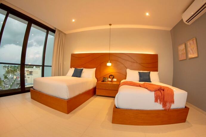 Imagen de la habitación del Hotel Puerto Libre Cozumel. Foto 13