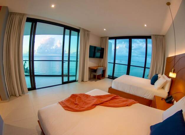 Imagen de la habitación del Hotel Puerto Libre Cozumel. Foto 17