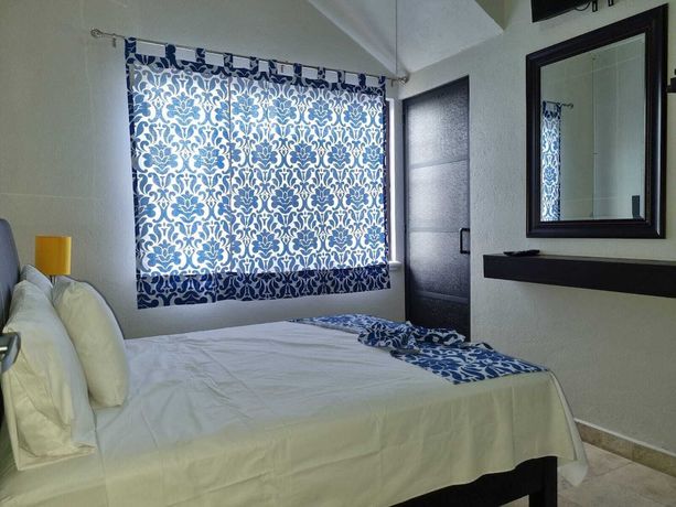 Imagen de la habitación del Hotel Puerto Morelos Cuernavaca. Foto 12