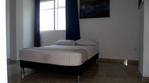 Imagen de la habitación del Hotel Puerto Vigia. Foto 4