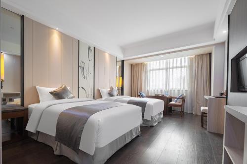 Imagen general del Hotel Puhui Tianchen Xiamen. Foto 11