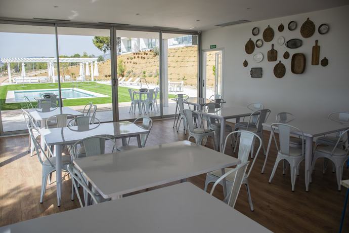 Imagen del bar/restaurante del Hotel Puig Campana Nature Suites and Btt. Foto 3