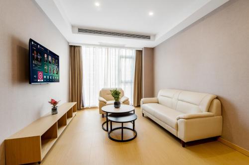 Imagen de la habitación del Hotel Pujue International. Foto 20