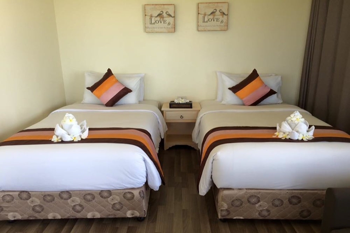 Imagen de la habitación del Hotel Puktien Cabana Beach Resort and Residence. Foto 10