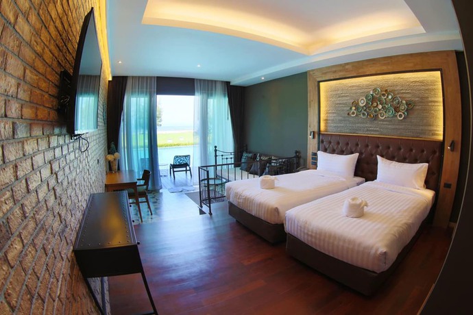 Imagen de los exteriores del Hotel Pulakorn Private Beach Resort. Foto 16