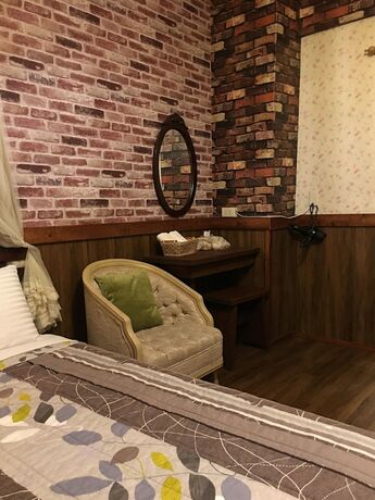 Imagen de la habitación del Hotel Puli Town Bed and Breakfast. Foto 17