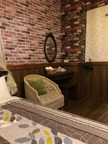 Imagen de la habitación del Hotel Puli Town Bed and Breakfast. Foto 20
