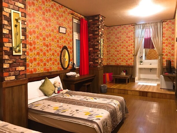 Imagen de la habitación del Hotel Puli Town Bed and Breakfast. Foto 23