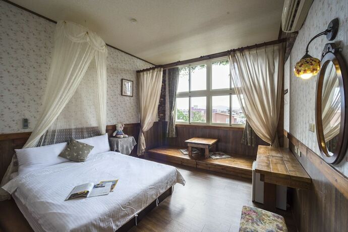 Imagen de la habitación del Hotel Puli Town Bed and Breakfast. Foto 25
