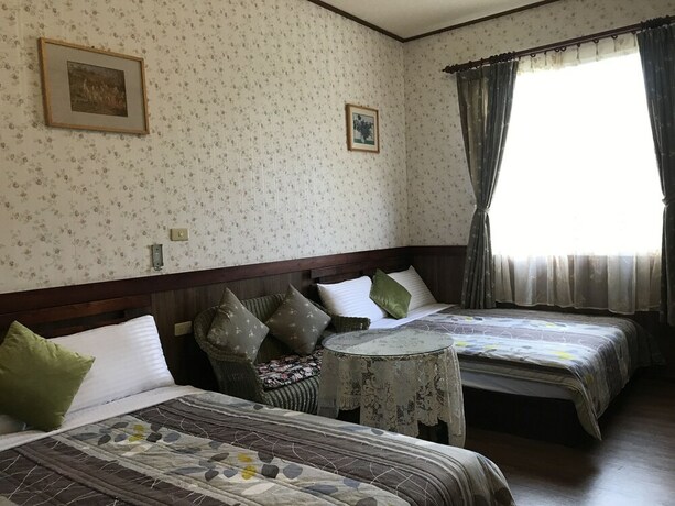 Imagen de la habitación del Hotel Puli Town Bed and Breakfast. Foto 27