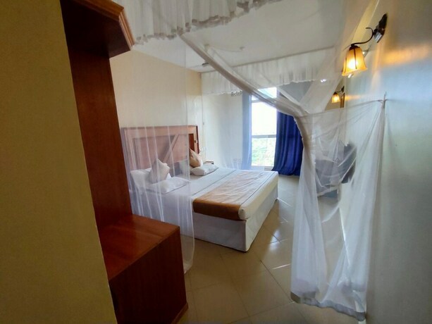 Imagen de la habitación del Hotel Pulickal Airport. Foto 22