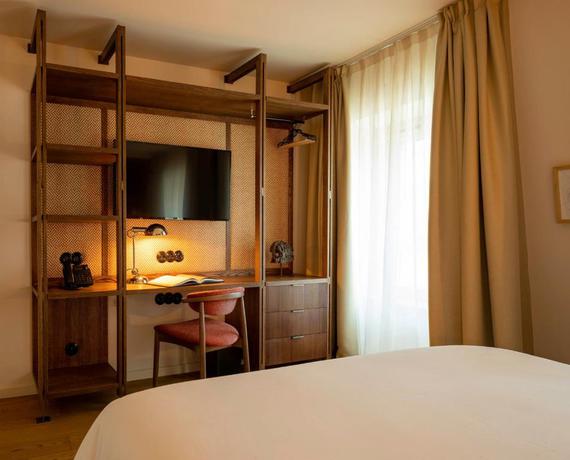 Imagen de la habitación del Hotel Pulitzer Paris. Foto 13