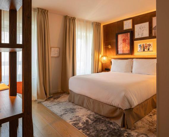 Imagen de la habitación del Hotel Pulitzer Paris. Foto 14