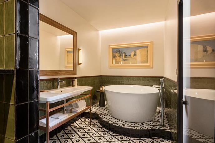 Imagen de la habitación del Hotel Pulitzer Paris. Foto 15