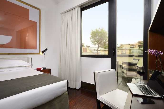Imagen de la habitación del Hotel Pulitzer Roma. Foto 5