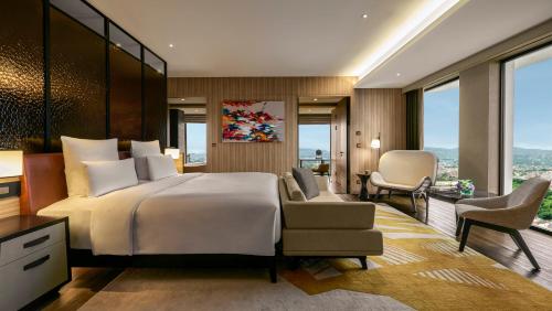 Imagen de la habitación del Hotel Pullman Bandung Grand Central. Foto 10