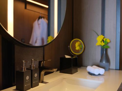 Imagen de la habitación del Hotel Pullman Bandung Grand Central. Foto 13