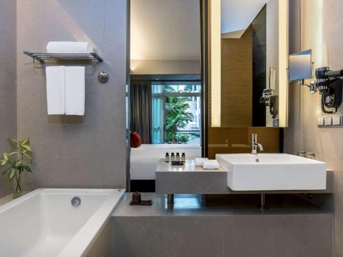 Imagen de la habitación del Hotel Pullman Bangkok King Power. Foto 18