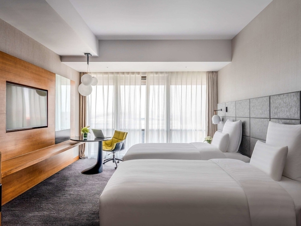 Imagen de la habitación del Hotel Pullman Baotou. Foto 12