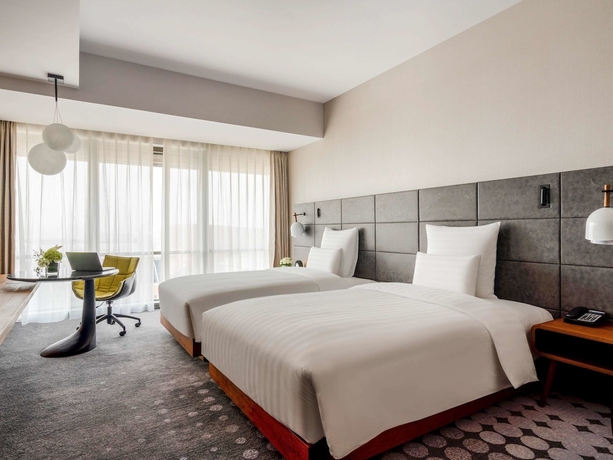 Imagen de la habitación del Hotel Pullman Baotou. Foto 14