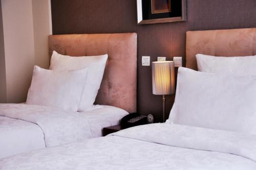 Imagen de la habitación del Hotel Pullman Beijing South. Foto 5