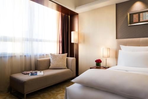 Imagen de la habitación del Hotel Pullman Beijing South. Foto 6